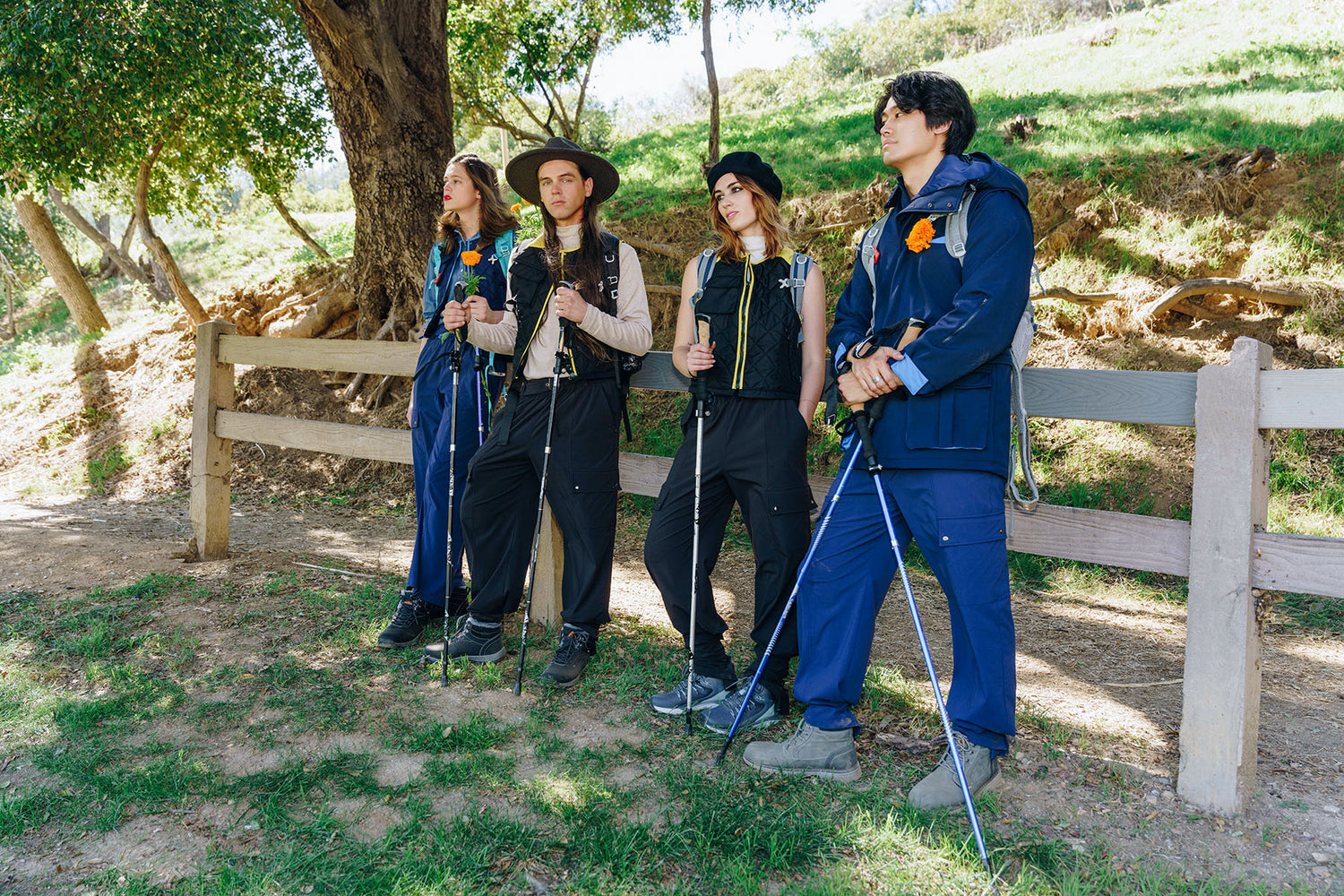 men and women wearing LMS By Lina Mayorga sustaunable activewear outerwear with elegant hiking gear